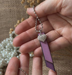 Porte clé duo de cuirs et charme