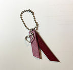 Porte clé duo de cuirs et charme