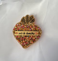 Broche Sacré Coeur ex voto en perles au message en cuir gravé Sois la lumière
