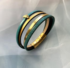 Bracelet manchette femme aux 4 cuirs turquoises et dorés décor feuille ginkgo