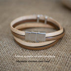 Bracelet style bohème plume sur double tour de cuir