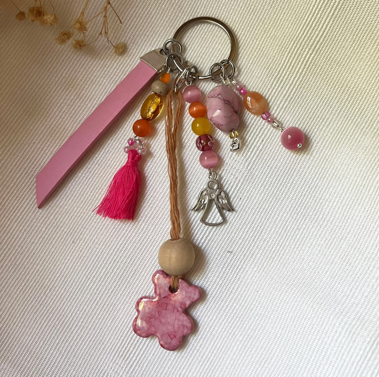 Bijou de sac multi breloques nounous rose et message cuir gravé