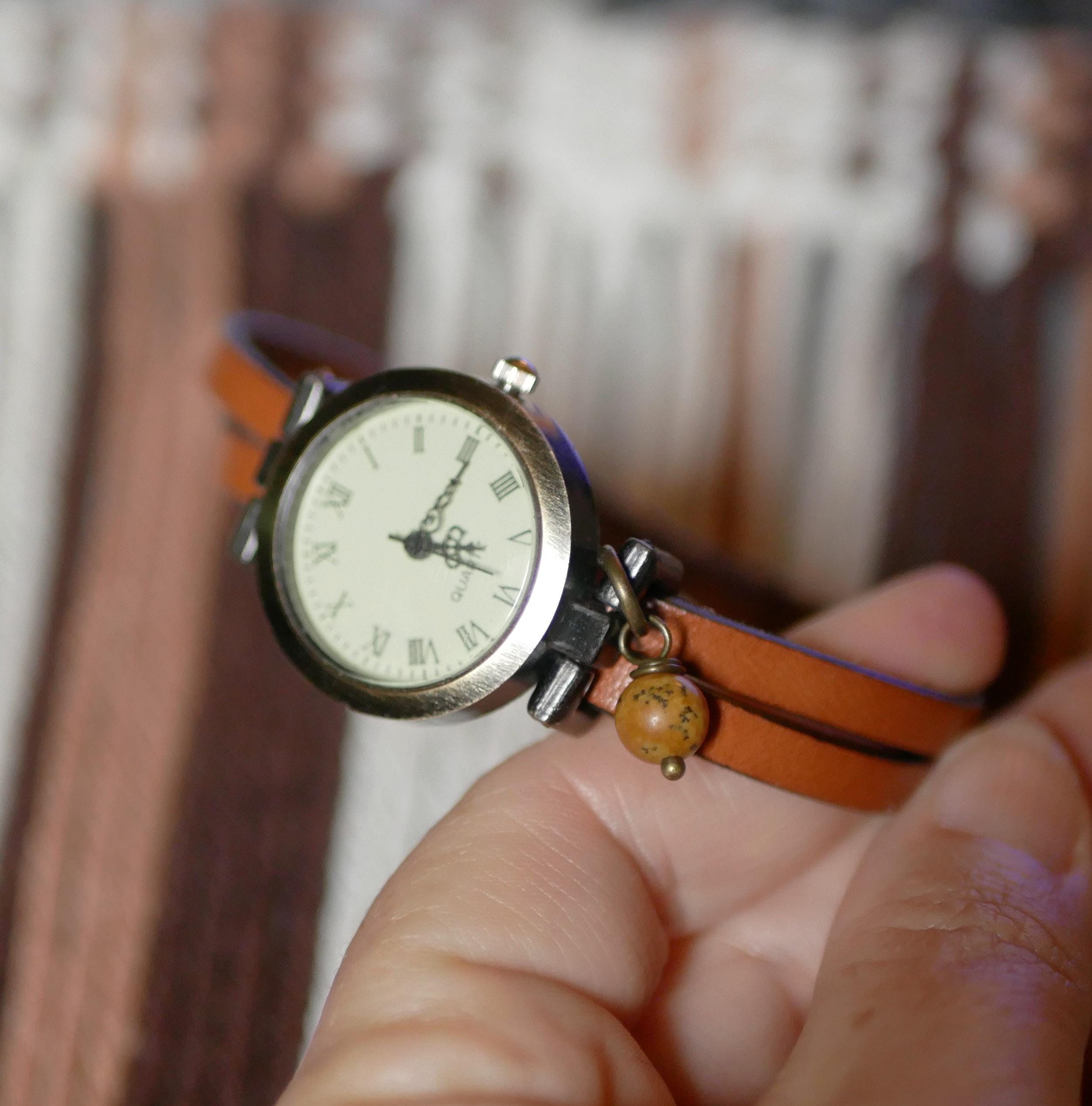 Montre femme vintage au bracelet cuir double