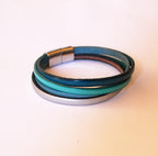Bracelet manchette femme aux 4 cuirs bleus turquoises
