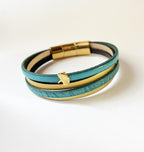 Bracelet manchette femme aux 4 cuirs turquoises et dorés décor feuille ginkgo
