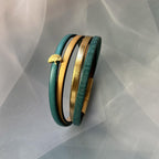 Bracelet manchette femme aux 4 cuirs turquoises et dorés décor feuille ginkgo