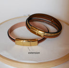 Bracelet femme multi-cuirs orange au charme coquillage doré