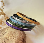 Lot de 5 bracelets en cuirs fins gravés d'une croix chrétienne