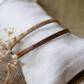 Deux bracelets cuir pour couple personnalisés par  gravure