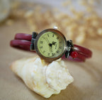 Montre femme vintage au bracelet cuir double