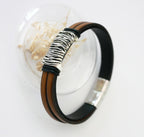 Bracelet cuir doublé fauve pièce centrale tressée métallisé