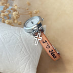 Montre femme cadran argenté bracelet cuir avec breloque pendentif