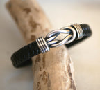 Bracelet homme noeud infini en acier sur cuir noir tressé élégant