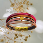 Bracelet manchette aux cuirs nacrées rose pêche
